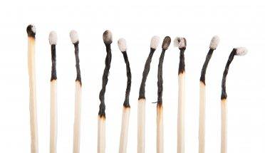 group of burnt matches (isolated on a white background)