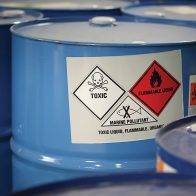 Container labelled toxic, flammable and pollutant.
